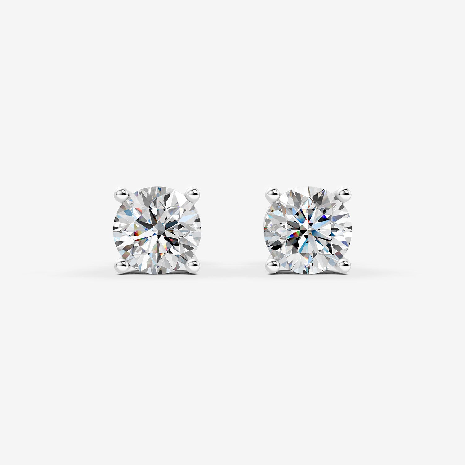 Classic Round Solitaire Earrings in 18K White Gold