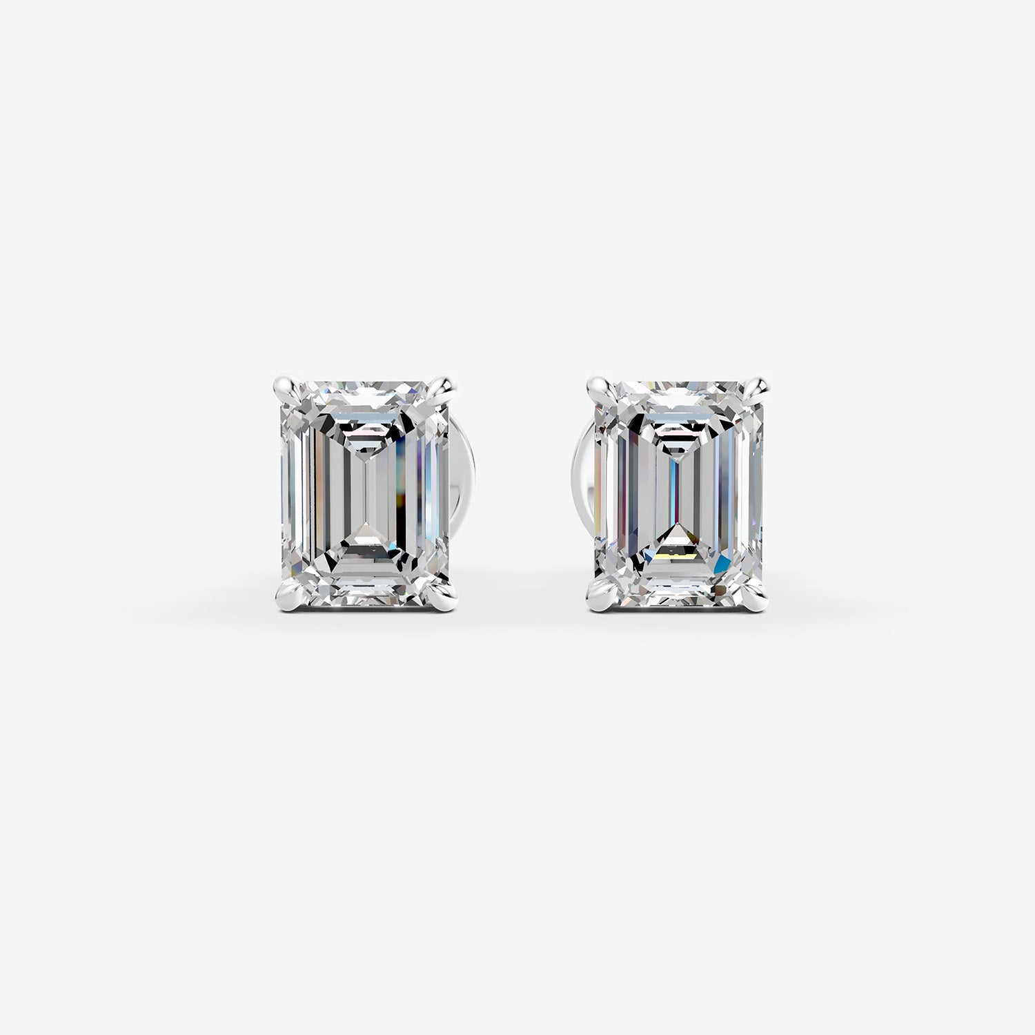Classic Emerald Solitaire Earrings in 18K White Gold