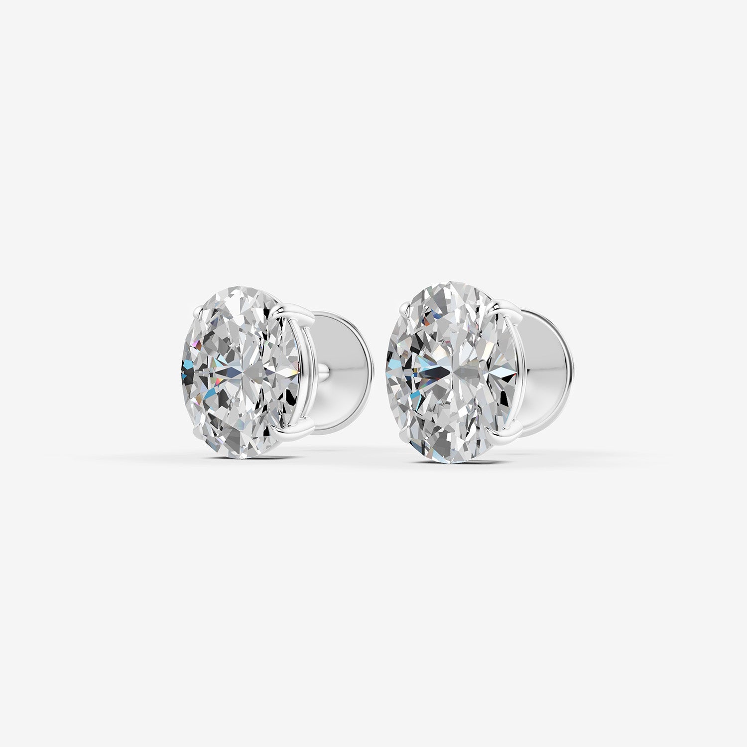 Classic Oval Solitaire Earrings in 18K White Gold