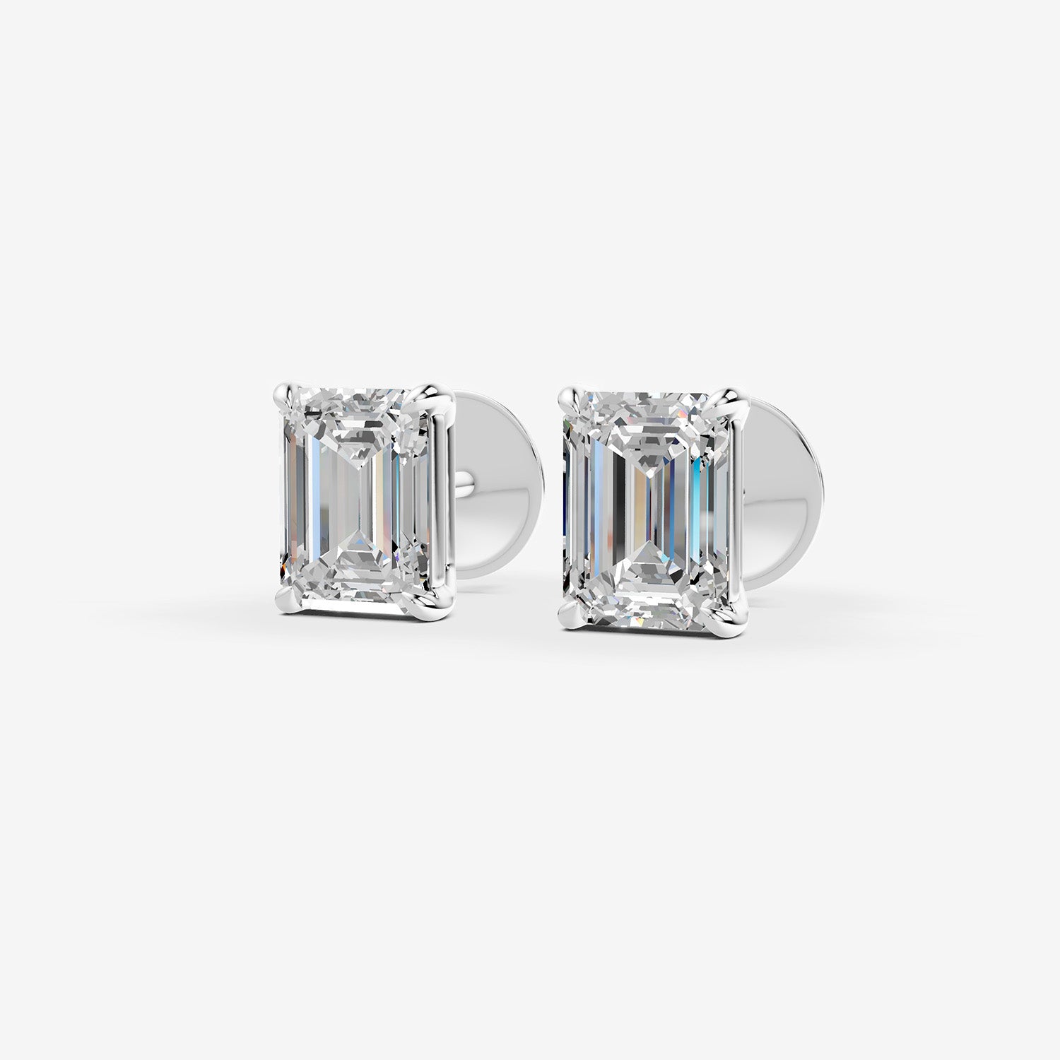 Classic Emerald Solitaire Earrings in 18K White Gold