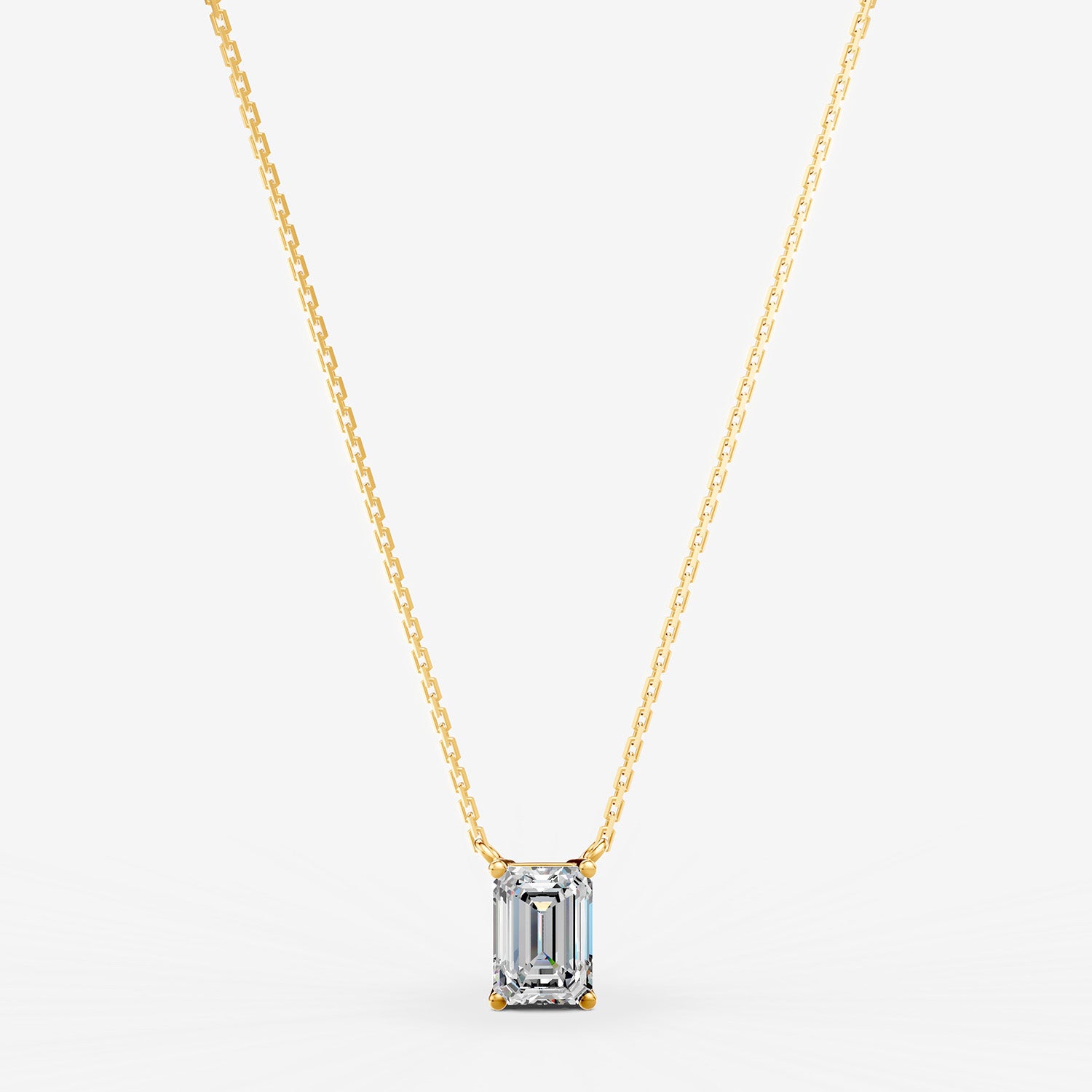 Classic Emerald Solitaire Pendant in 18K Yellow Gold