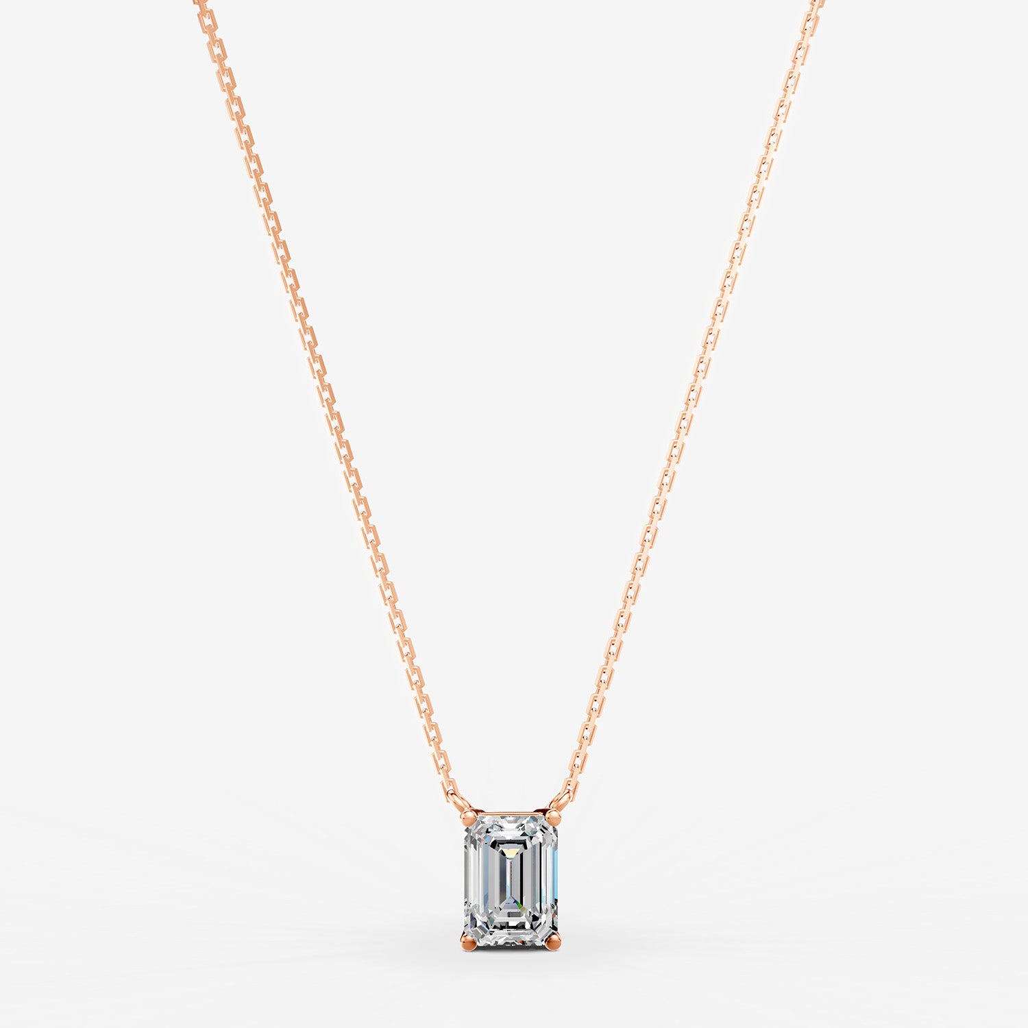 Classic Emerald Solitaire Pendant in 18K Rose Gold