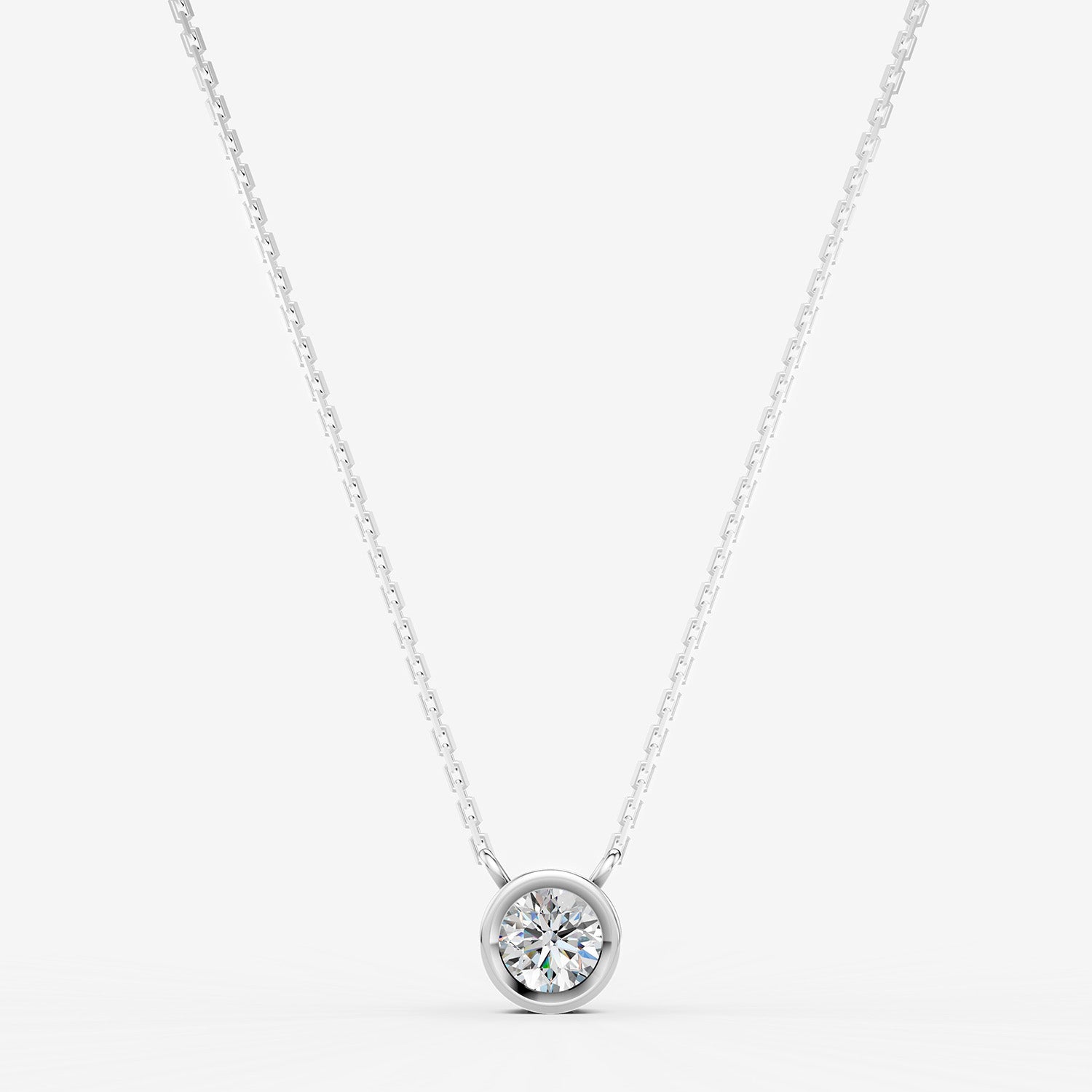 Bezel Round Solitaire Pendant in 18K White Gold