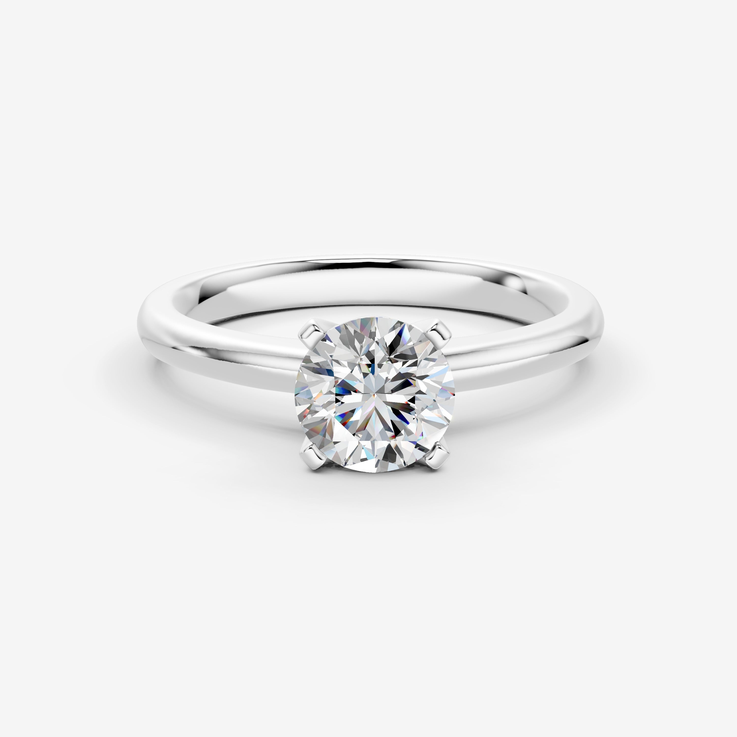 Classic Round Solitaire Ring in 18K White Gold